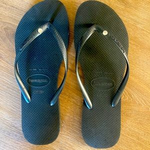 New never worn. Black Havianas flip flops Crystal
